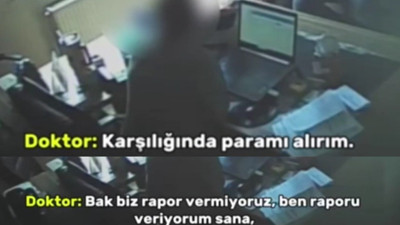 Para karşılığı rapor veren doktor kameraya yakalandı