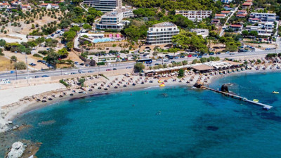 Komşu'da bir g&uuml;nl&uuml;k plaj keyfi 100 Euro'yu aşıyor